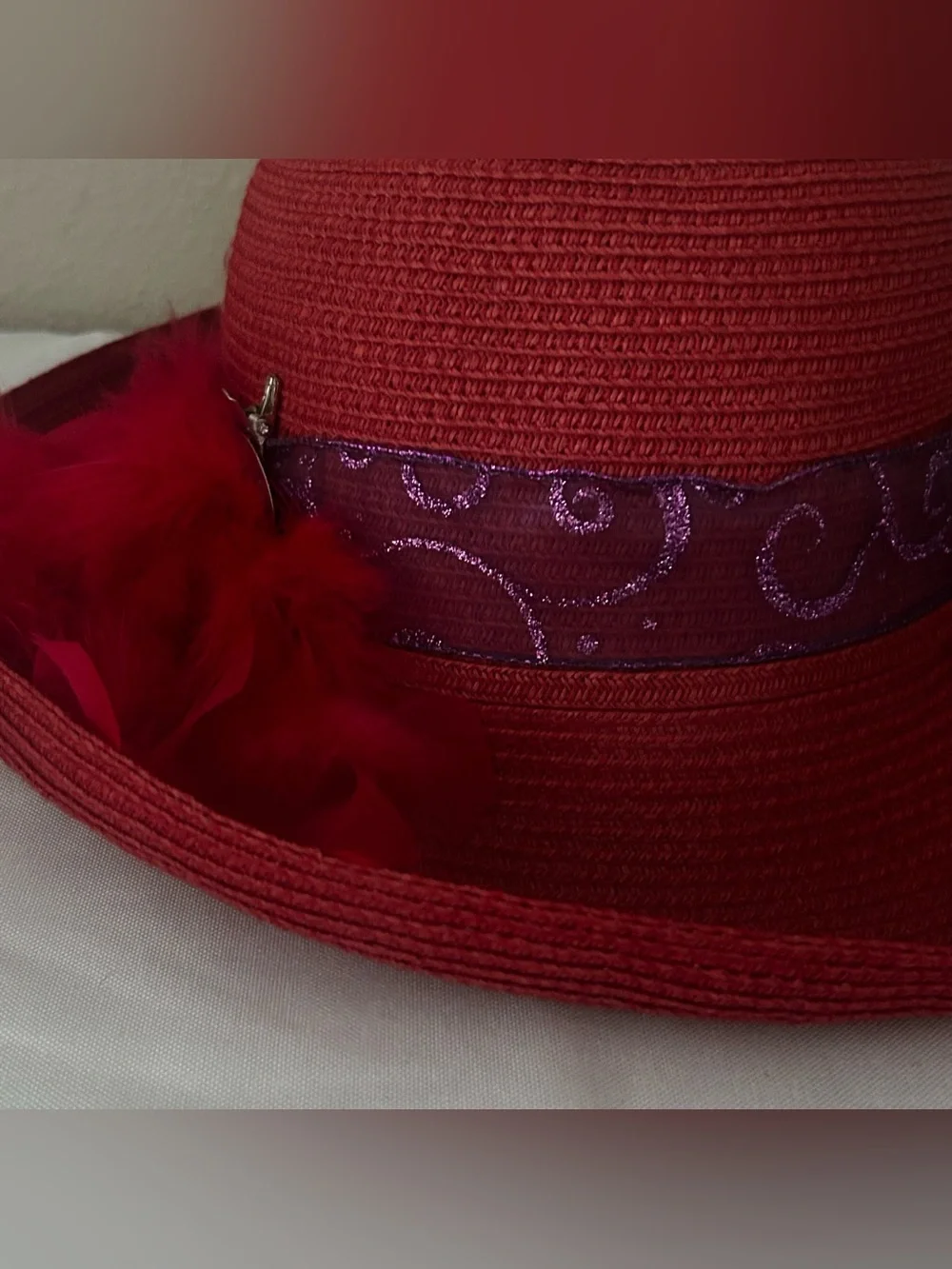 Elegant Red Wide-Brim Hat with Feather Accent